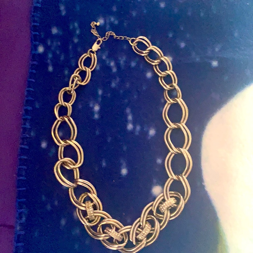 Silvertone chain necklace with rhinestone details